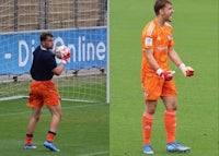 two soccer players standing next to each other on a soccer field